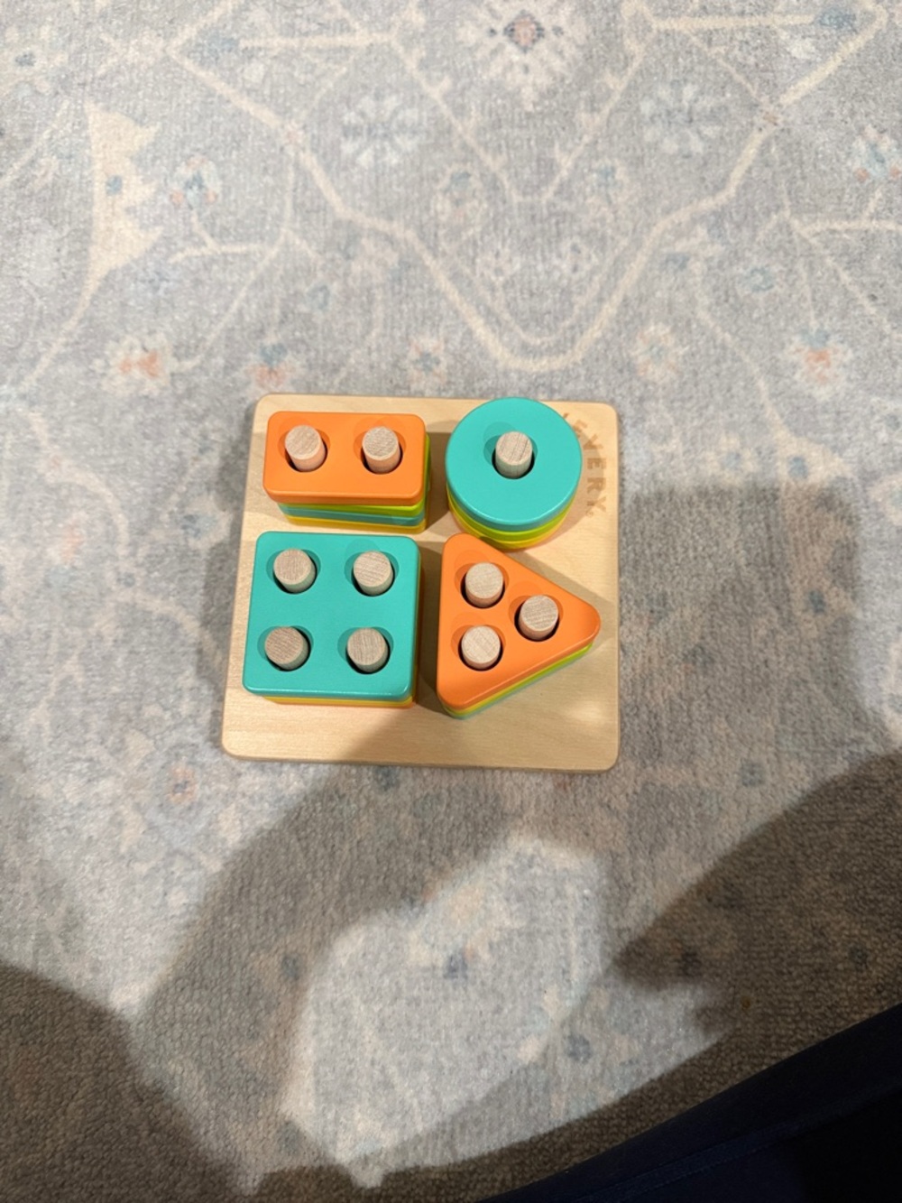 Colorful Wooden Shape Stacker Toy in Teal & Orange